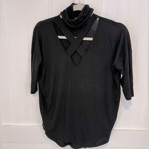 Express short sleeved black top with crisscross neckline size XXSP